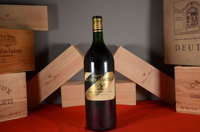 a bottle of wine that is sitting on a table