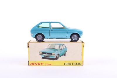 a blue toy car sitting on top of a box