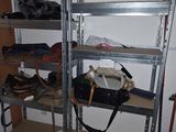 a shelf with a hat on top of it in a room