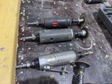 many tools that are laying out on a table
