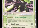 carte Pokémon représentant un personnage Pokémon vert et noir