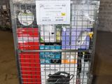 a metal cart with many items in it in a warehouse