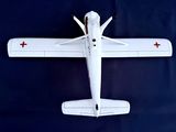 a model airplane that is sitting on a blue surface