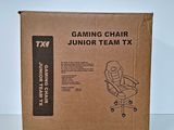 the box for the gaming chair is open and ready to be used