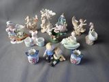 a lot of figurines that are sitting on a table