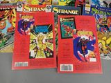 a lot of comic books sitting on a table