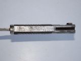 an image of a metal object with a piece of metal in it