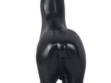 black stag statue on black base on white background