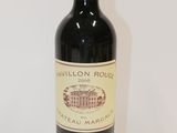 a bottle of wine that is sitting on a table