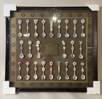 a picture of a display case with a lot of spoons on it