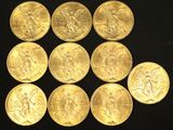 six gold sovereigns of different sizes and shapes on a black surface
