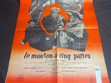 an orange and black poster with a picture of a man on a motorcycle