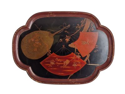 a tray with a decorative design on it on a white background