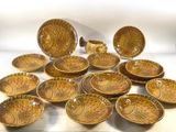 a lot of bowls that are sitting on a table