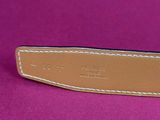 a close up of a leather belt with white stitching on it