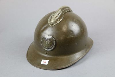 a helmet with a sticker on it sitting on a table