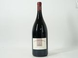 a bottle of wine that is sitting on a table