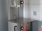 a machine that is sitting on a counter in a kitchen