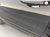 a close up of a car door handle and the door handle is missing