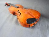 a violin that is sitting on a table