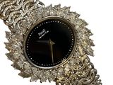 an image of a close up of a watch on a white background