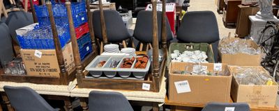 many boxes of food and drinks on the table