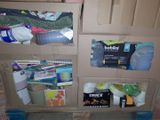 a cardboard box that has a bunch of items in it