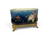 a bathtub with flowers and fruit on it on a stand