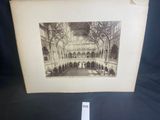 an old picture of a building with a clock on it