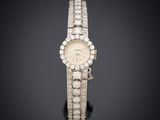 a lady ' s diamond set wristwatch, by cartier