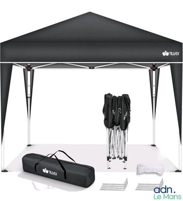 a close up of a tent with a bag and umbrellas