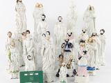 a lot of figurines that are sitting on a table