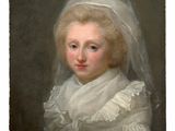 portrait of a young girl in a white dress with a veil