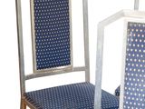 three chairs that are sitting next to each other