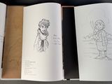 three pages of a book with drawings of people on them