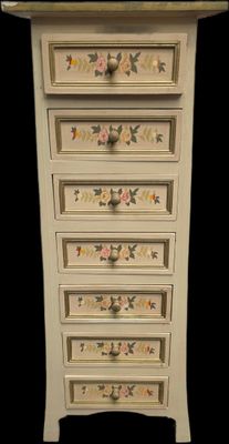une commode blanche décorée de fleurs peintes