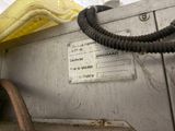 an image of a machine with a hose attached to it ' s side
