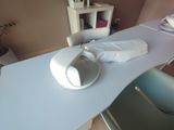 a table with a bowl on top of it in a room