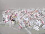 a lot of candy wrapped in plastic bags on a table