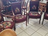 a lot of chairs that are sitting in a room
