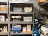 a room with a lot of shelves and containers on the shelves
