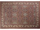 un ancien tapis persan à motif de médaillon