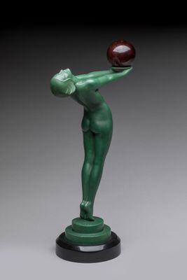 an image of a statue of a woman holding a ball