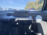 a car dashboard with a cell phone in it