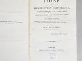 an open book with a black and white title on it