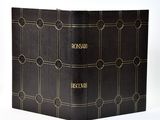 the front cover of a black book with gold writing on it