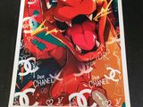 a close up of a picture of a red dragon on a table