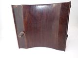 a wooden door with a metal latch on it