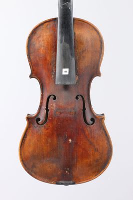 an old violin with a bow on a white background