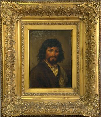 un tableau représentant un homme barbu dans un cadre en or